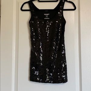 Black top with black sequins on the front